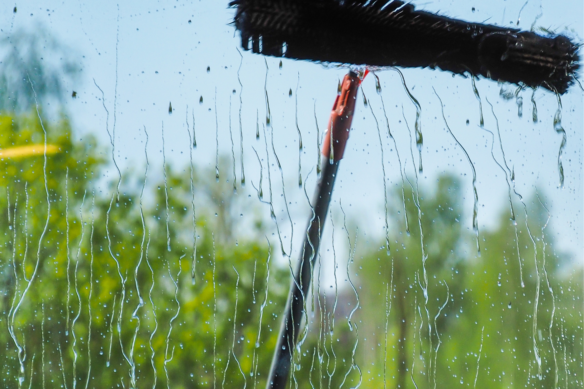 Image of a window cleaning brush at work in Keizer